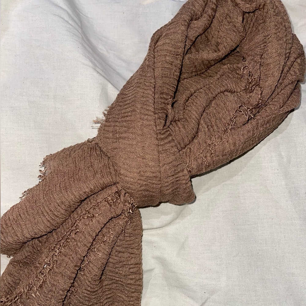 Unused light weight scarf in brown color